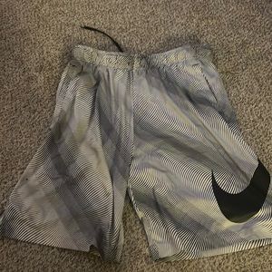 Nike black white pattern shorts, size large.  Small hole in front (see pictures)